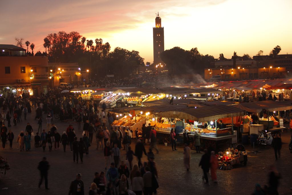Food stalls of the Jemaa el-Fnaa night market in Marrakech seen at sunset
