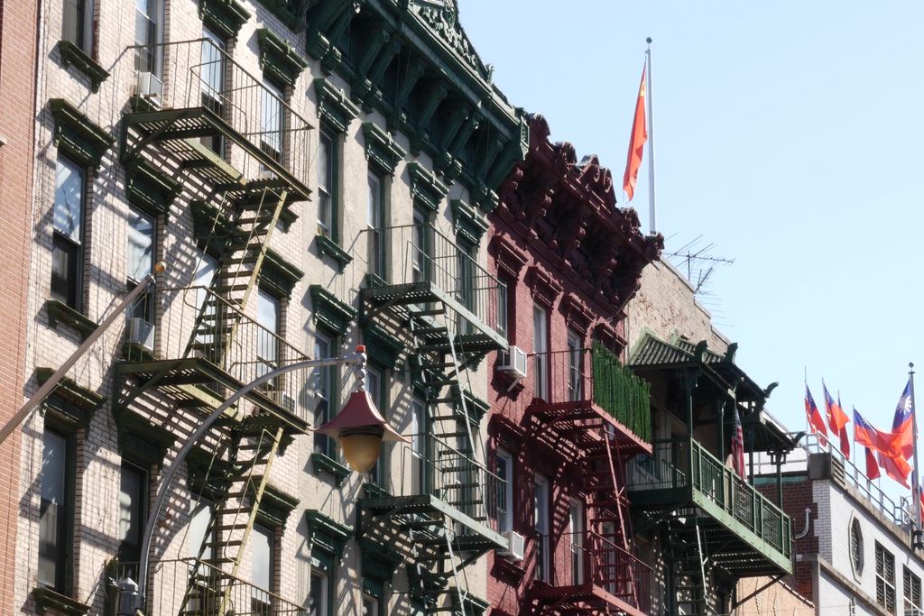 Chinatown street in Manhattan, New York, with Chinese signs and shopfronts