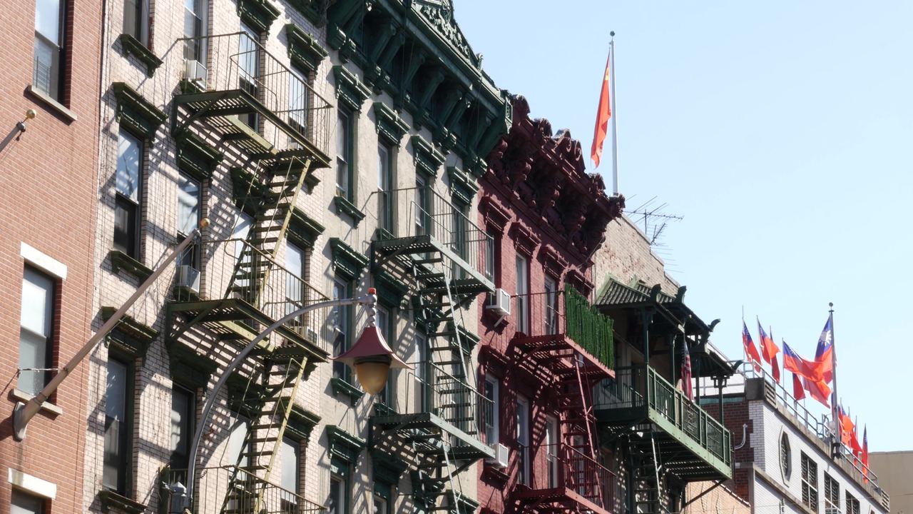 Chinatown street in Manhattan, New York, with Chinese signs and shopfronts