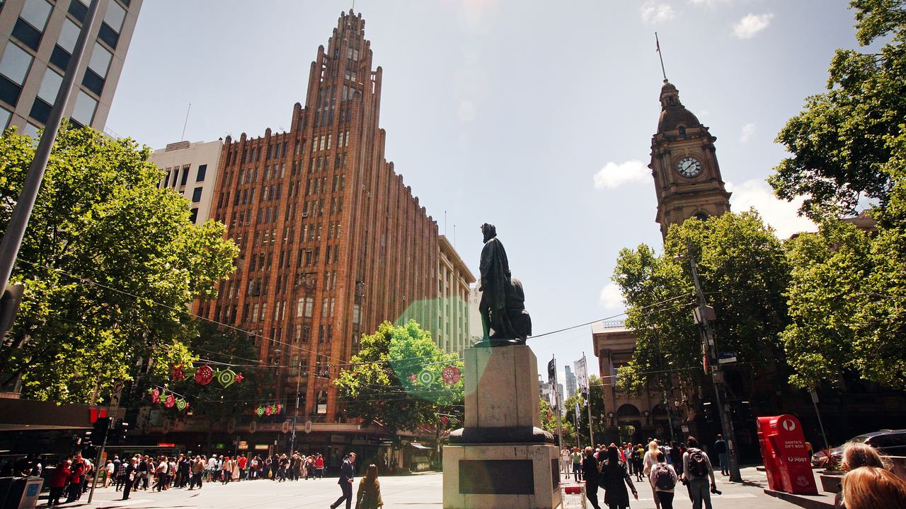 People walking down a busy street in central Melbourne, Australia