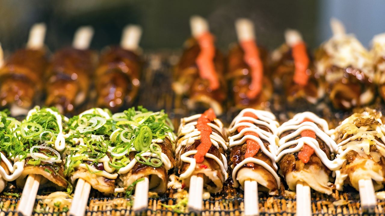 Traditional Japanese street food stall with signage in central Tokyo